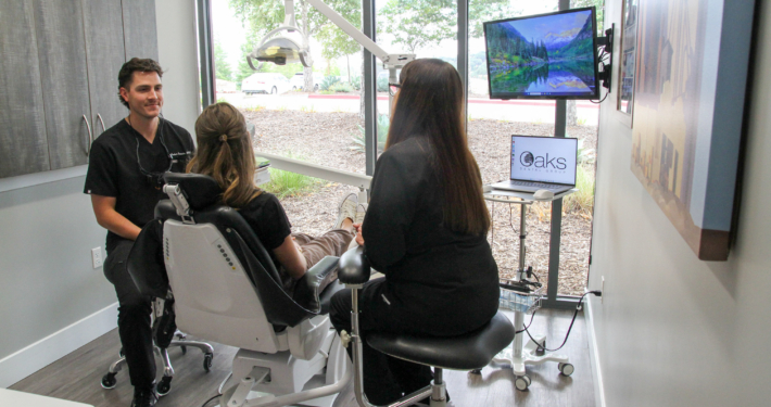Oaks Dental | Dr Graham with patient